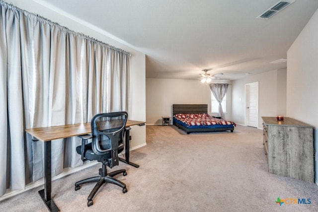 9012 Huxley Dr, Providence Village, TX 76227 - carpeted bedroom with an office area, ceiling fan, and baseboards