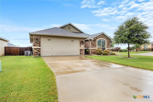 1212 Wethersfield Ln, Temple, TX 76504 - ranch-style house featuring brick siding, concrete driveway, an attached garage, and roof with shingles