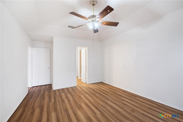 unfurnished room featuring dark hardwood / wood-style floors and ceiling fan