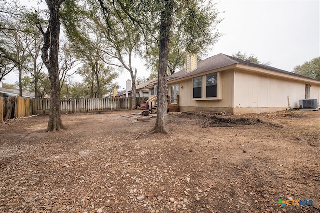 view of yard with central AC