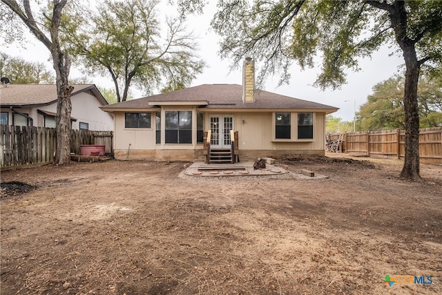 rear view of house with french doors