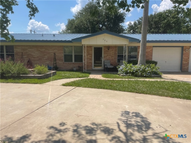 single story home with a garage