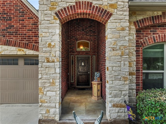 property entrance featuring a garage