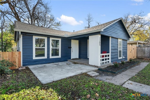 ranch-style house featuring a patio