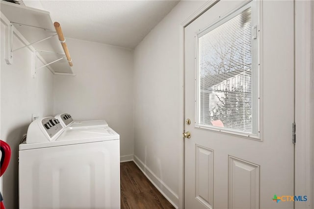 washroom featuring dark hardwood / wood-style floors and independent washer and dryer