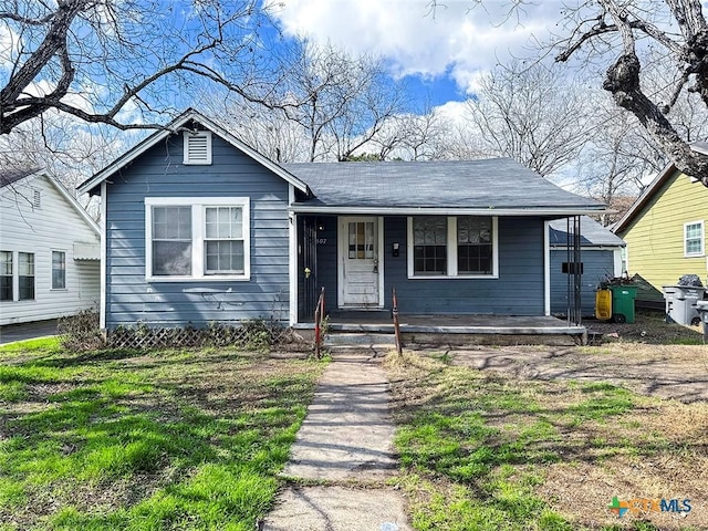 bungalow with a garage and a porch