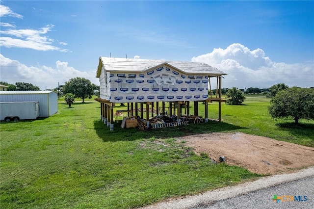 exterior space with a front lawn