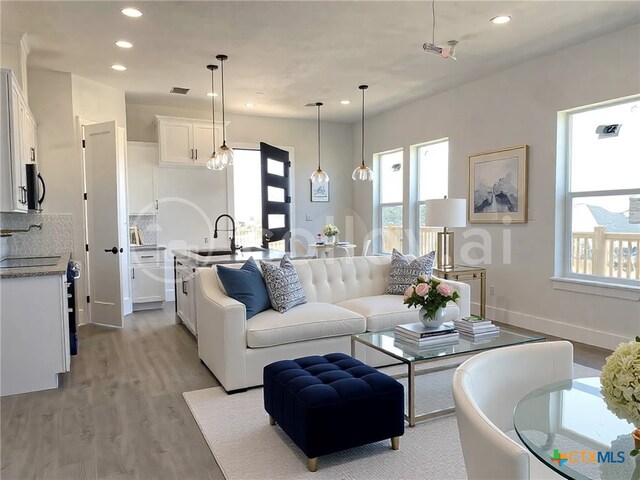 bathroom featuring vanity, tiled shower, and toilet