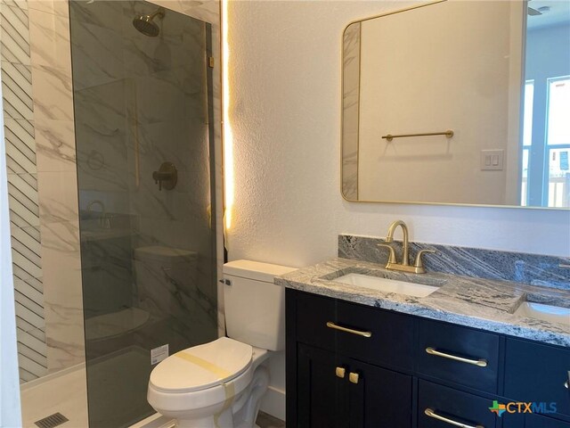 bathroom featuring a tile shower