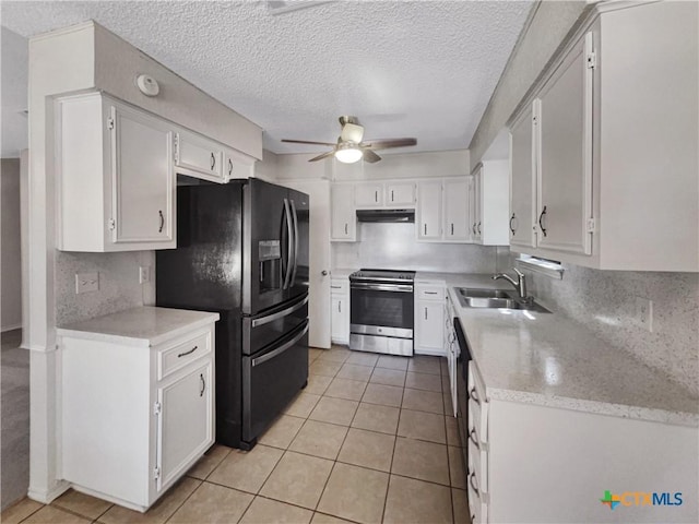 1009 N 4th St, Copperas Cove, TX 76522 - kitchen featuring stainless steel electric stove, a sink, black fridge with ice dispenser, ceiling fan, and under cabinet range hood