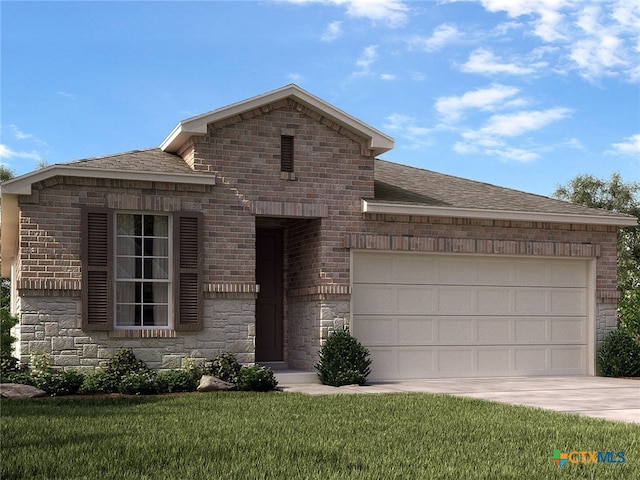 view of front of house featuring a front yard and a garage