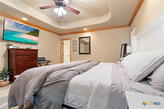 bedroom with a ceiling fan, a raised ceiling, crown molding, and recessed lighting