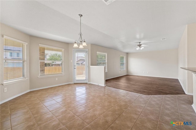 6208 Suellen Ln, Killeen, TX 76542 - tiled empty room featuring a ceiling fan and a chandelier