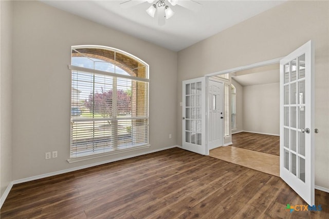 6208 Suellen Ln, Killeen, TX 76542 - empty room with french doors, healthy amount of natural light, wood finished floors, and a ceiling fan