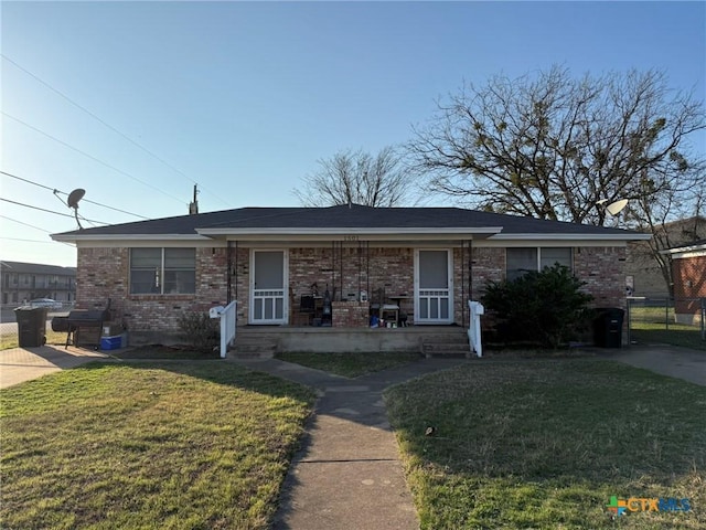 1501-1503 Bundrant Dr, Killeen, TX 76543 - view of front facade with brick siding, a front lawn, and fence