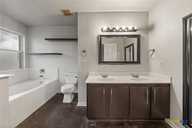 bathroom with vanity, hardwood / wood-style flooring, toilet, and a bathtub