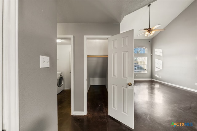 laundry area with washer / dryer, a textured ceiling, and ceiling fan