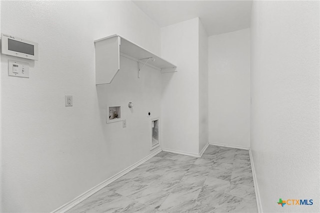 210 Mancos Dr, Georgetown, TX 78626 - washroom with marble finish floors, hookup for a gas dryer, washer hookup, and electric dryer hookup