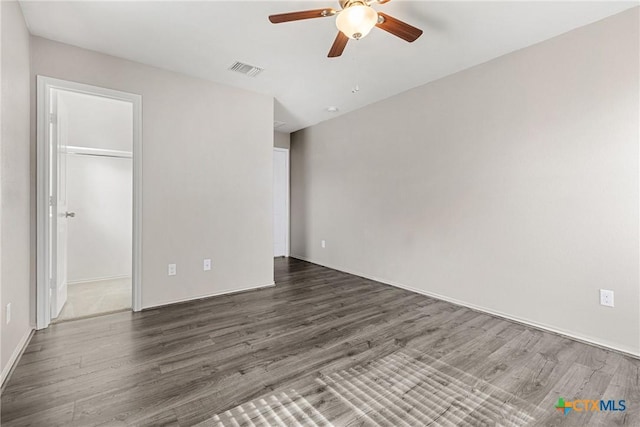 210 Mancos Dr, Georgetown, TX 78626 - unfurnished bedroom featuring wood finished floors, a closet, and ceiling fan