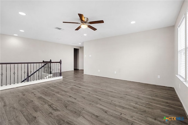 210 Mancos Dr, Georgetown, TX 78626 - spare room with ceiling fan, wood finished floors, plenty of natural light, and recessed lighting