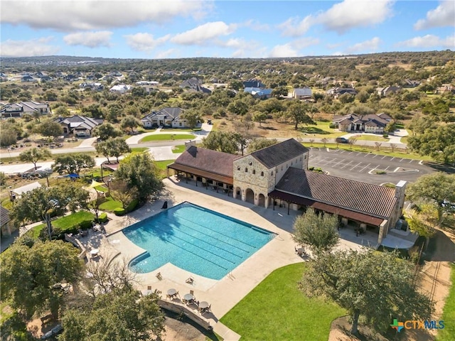 community pool with a patio