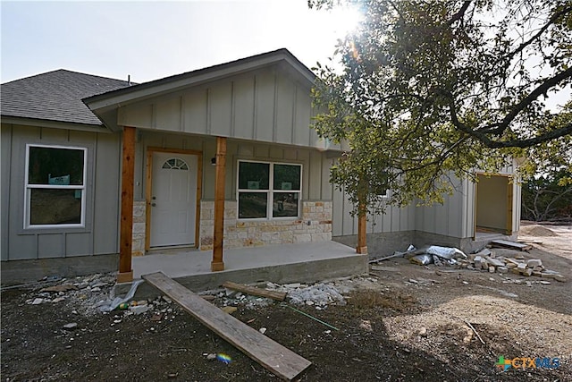 view of front of home with a patio area