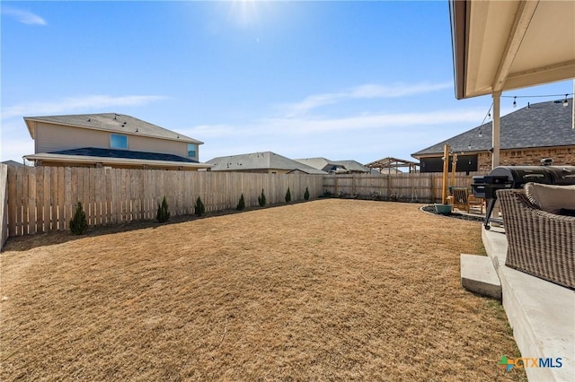 view of yard featuring a fenced backyard