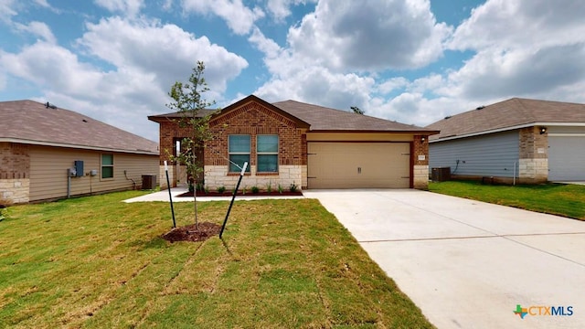 view of front facade with central AC, a front lawn, and a garage