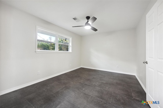 spare room featuring ceiling fan