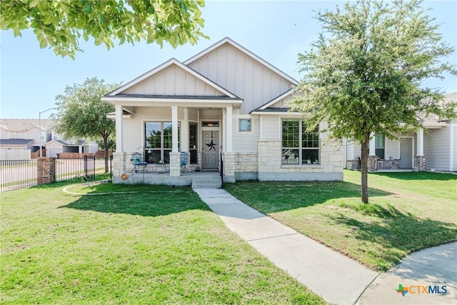 7624 Copper Creek Trl, Temple, TX 76502 - craftsman-style home with board and batten siding, a porch, and stone siding