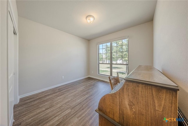 7624 Copper Creek Trl, Temple, TX 76502 - unfurnished office with dark wood-style flooring and baseboards