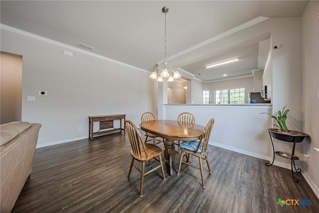 7624 Copper Creek Trl, Temple, TX 76502 - dining room featuring dark wood-style floors, ornamental molding, and baseboards