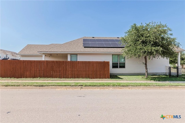 7624 Copper Creek Trl, Temple, TX 76502 - view of home's exterior featuring solar panels and a shingled roof