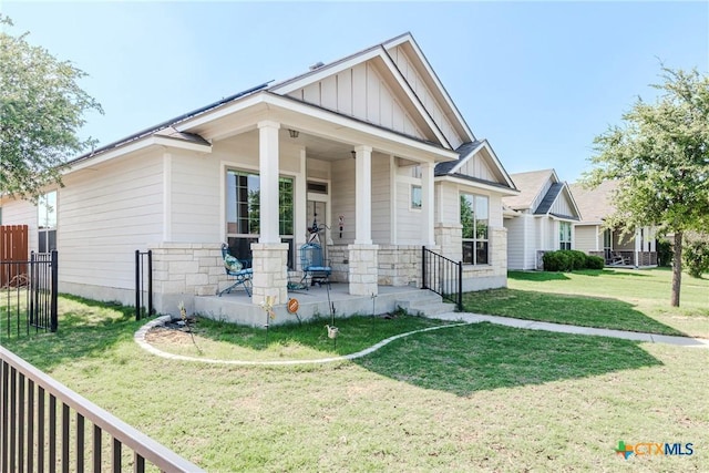 7624 Copper Creek Trl, Temple, TX 76502 - craftsman-style home featuring board and batten siding, stone siding, and covered porch