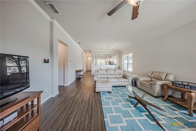 7624 Copper Creek Trl, Temple, TX 76502 - living area with dark wood finished floors, a ceiling fan, baseboards, and ornamental molding