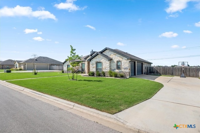 single story home with a garage and a front yard