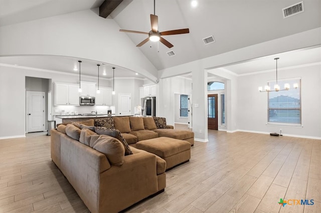 living room featuring high vaulted ceiling, beam ceiling, ceiling fan with notable chandelier, and light hardwood / wood-style flooring