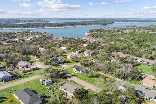 birds eye view of property with a residential view and a water view