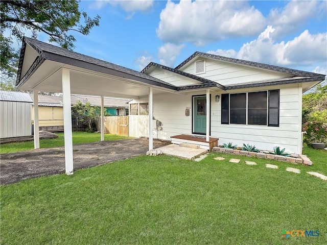 1412 Laurie Dr, Canyon Lake, TX 78133 - single story home featuring a carport