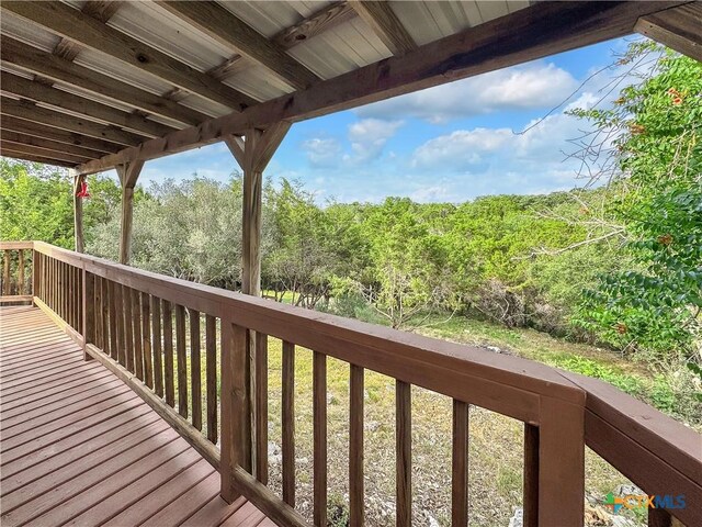 1412 Laurie Dr, Canyon Lake, TX 78133 - wooden terrace featuring a forest view