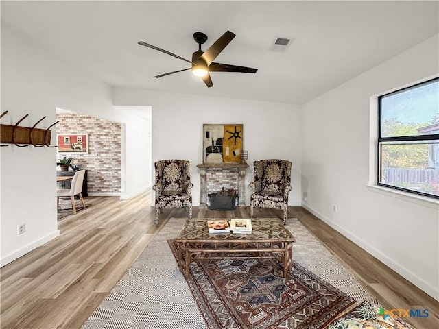 1412 Laurie Dr, Canyon Lake, TX 78133 - sitting room with ceiling fan, wood finished floors, and baseboards