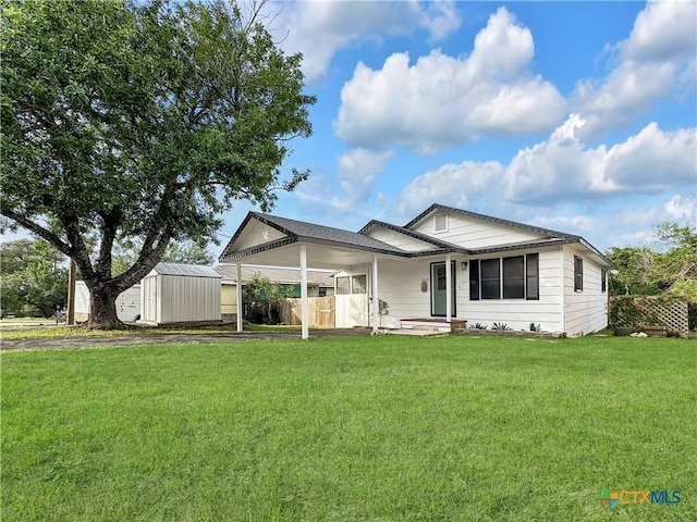 1412 Laurie Dr, Canyon Lake, TX 78133 - ranch-style home with an attached carport