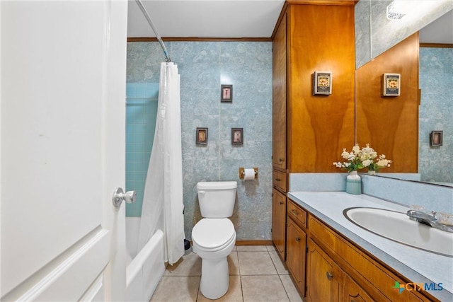 full bathroom featuring shower / tub combo with curtain, vanity, tile patterned flooring, and toilet