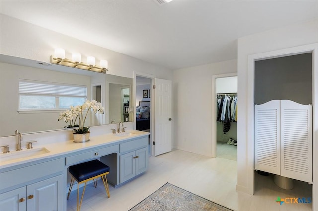 209 Full Moon, Horseshoe Bay, TX 78657 - bathroom with double vanity and tile patterned floors