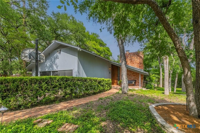 2518 Marlandwood Rd, Temple, TX 76502 - view of side of home with a chimney