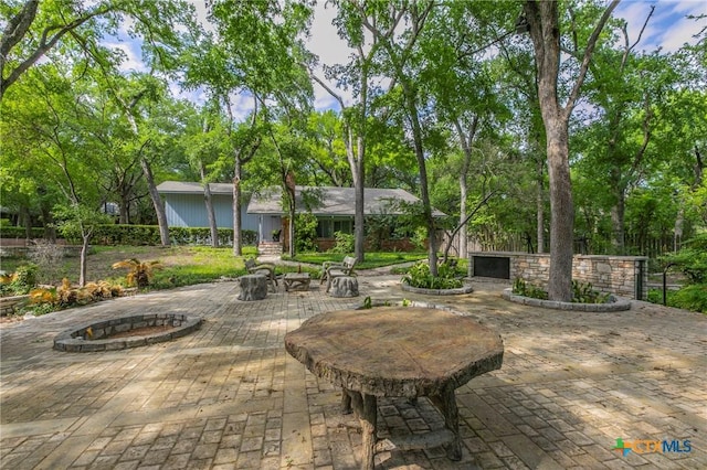 2518 Marlandwood Rd, Temple, TX 76502 - view of patio with an outdoor fire pit
