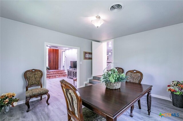 2518 Marlandwood Rd, Temple, TX 76502 - dining area with visible vents, baseboards, and wood finished floors