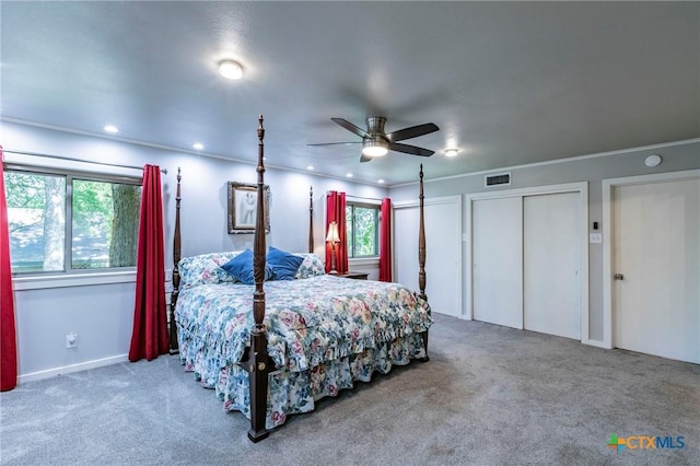 2518 Marlandwood Rd, Temple, TX 76502 - carpeted bedroom with two closets, ceiling fan, and visible vents