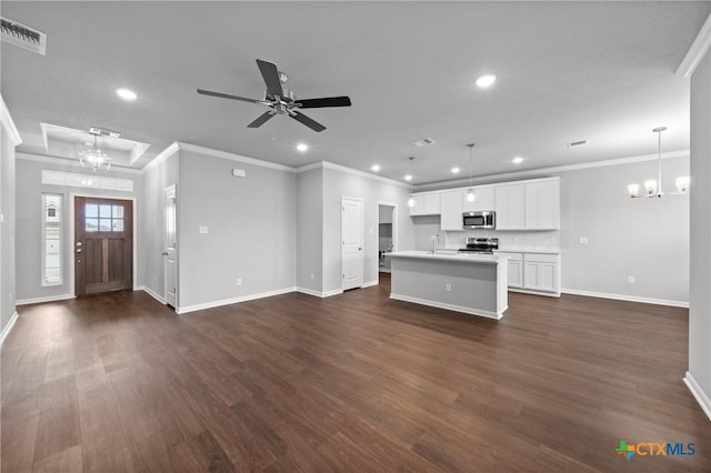 618 Seven Springs Dr, Temple, TX 76502 - unfurnished living room featuring visible vents, a sink, crown molding, recessed lighting, and dark wood-type flooring