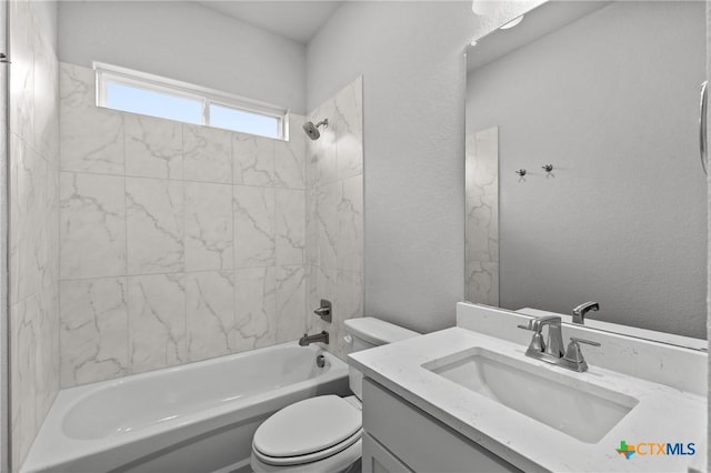 618 Seven Springs Dr, Temple, TX 76502 - full bathroom with toilet, shower / bathing tub combination, vanity, and a textured wall